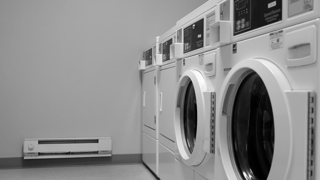 5 Essential Appliance Maintenance Tips for Every Homeowner a row of washing machines